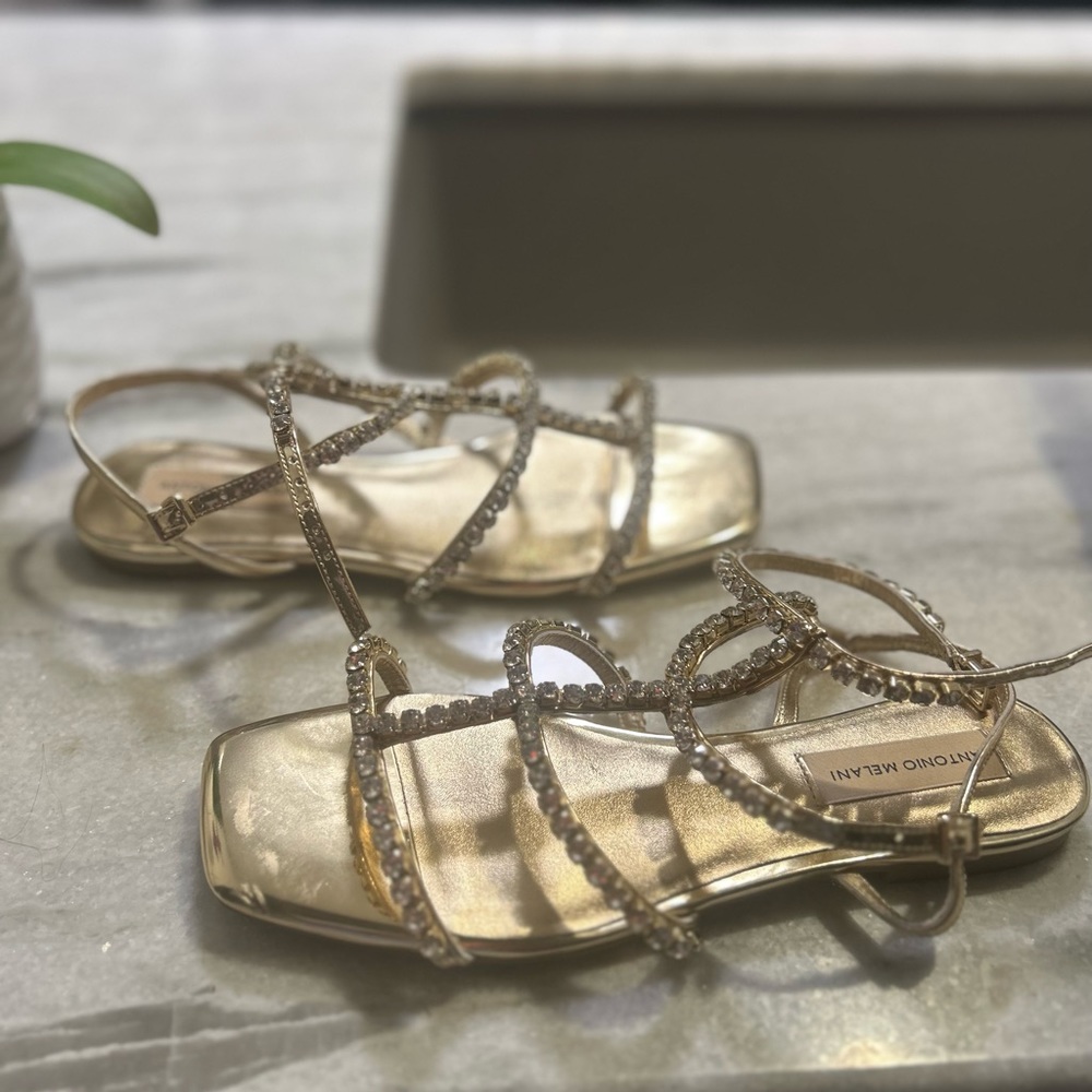 Beautiful gold sandals with crystals by Antonio Melani size 8 , worn them twice